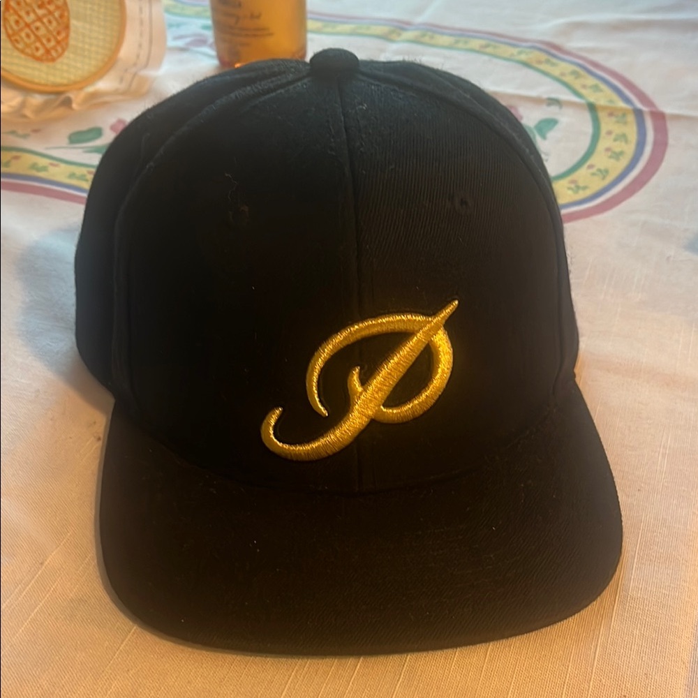 Primitive Black Cap with Gold Tag